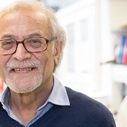Azim Surani in his lab at the Gurdon Institute