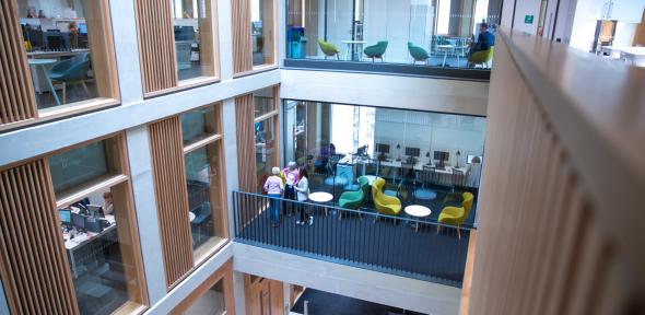 Staff in University buildings are asked to reduce the thermostat temperature to 19 degrees A picture taken within the student services centre, showing two different floors.