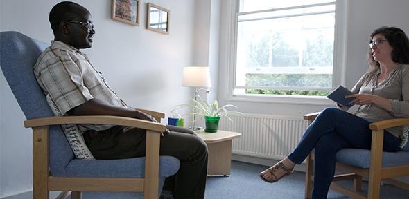 Two people sitting and talking Counselling session